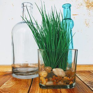 Faux grass in glass vase w/epoxy resin